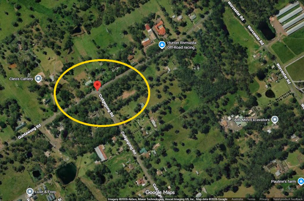 Google Maps satellite view of the Cudgegong Road and Guntawong Road corner in Riverstone East, near the reserved high school site, circled in yellow