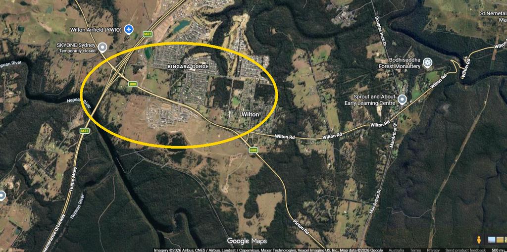 Google Maps satellite view of the Hume Motorway and Picton Road junction at Wilton NSW 2571, the hub of Wilton new town