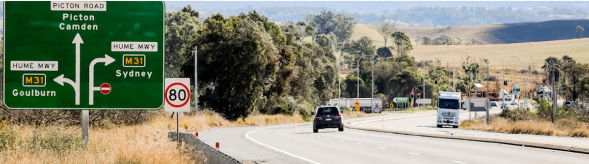 Road sign where the Hume Motorway meets Picton Road near Wilton